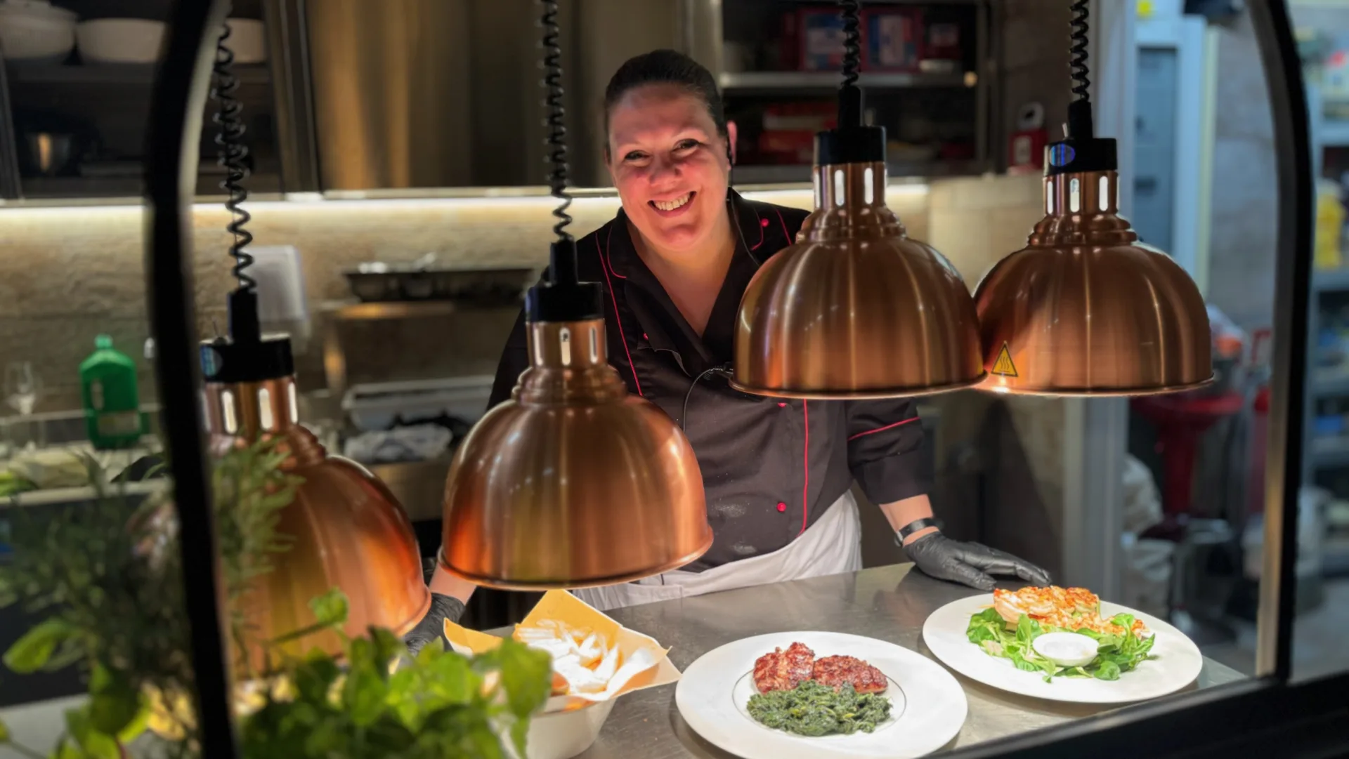 The Hosteria's chef at the open-kitchen pass